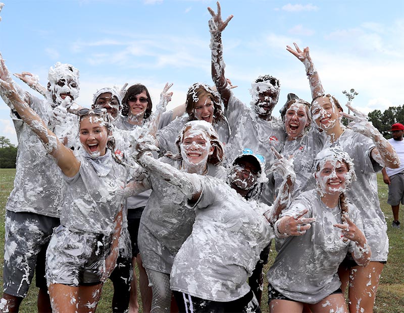 Students posing after a shaving cream fight during Dawg Camp Discovery